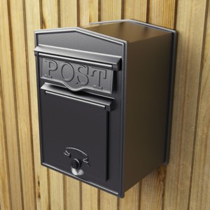Postbox fitted to a garden fence