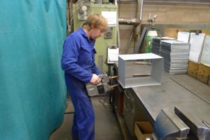 Letterbox sleeve bottom being welded into place