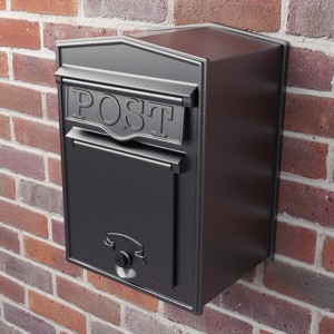 Mailbox fitted onto a brick wall