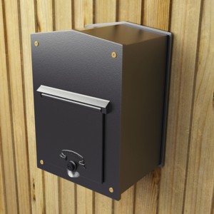  Letterbox fitted to a wooden fence